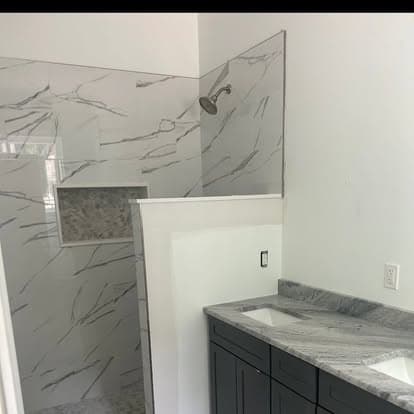 Complete bathroom remodel with calacatta marble and custom vanity